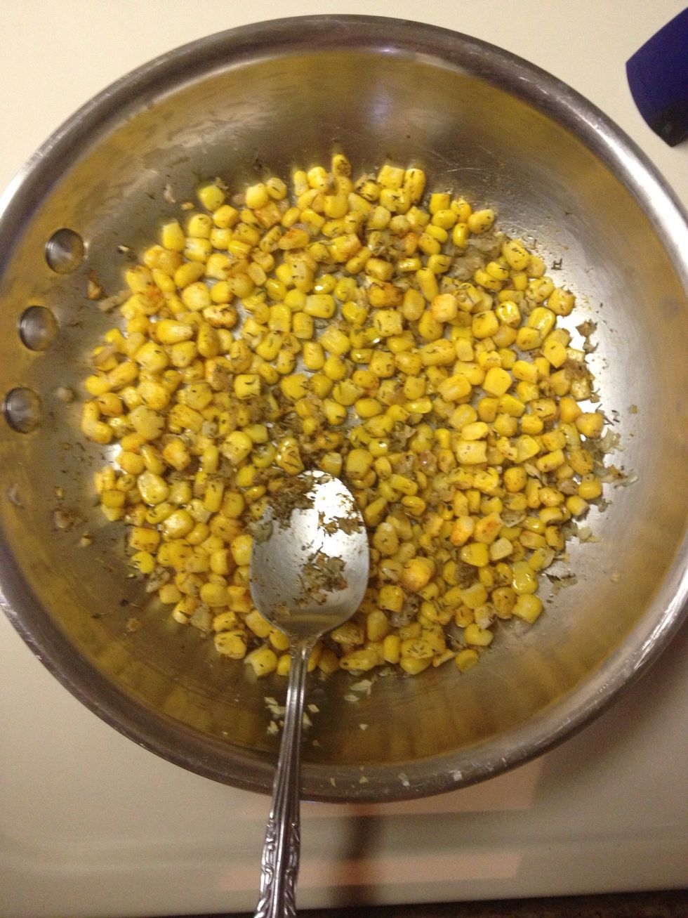 Add 3/4 cup sweet corn (I used frozen)            1 teaspoon dried thyme,  1/4 teaspoon salt, & 1/8 teaspoon black pepper. Cook for 5 minutes stirring occasionally.
