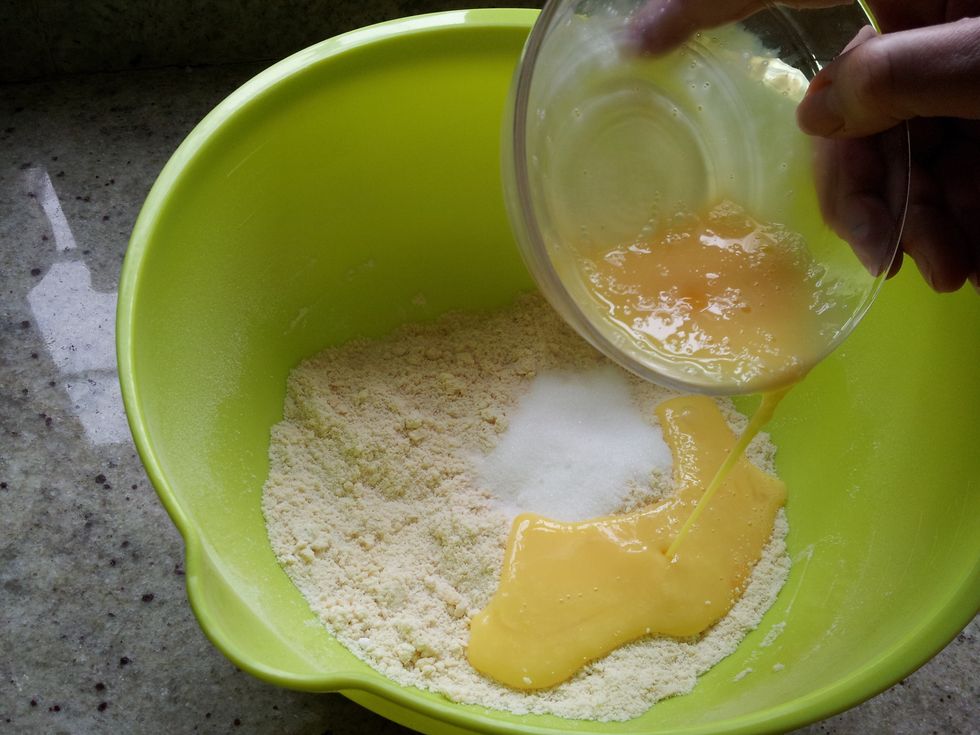 Add 3/4 of the beaten egg