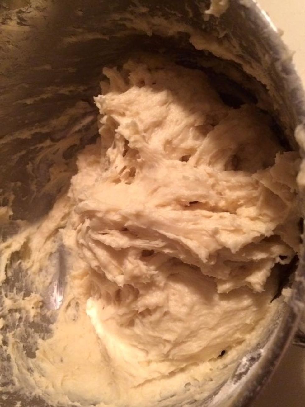 Add 3 cups of all purpose flour and mix it with a rice scoop, or by hand. And let the dough rise for about an hour.