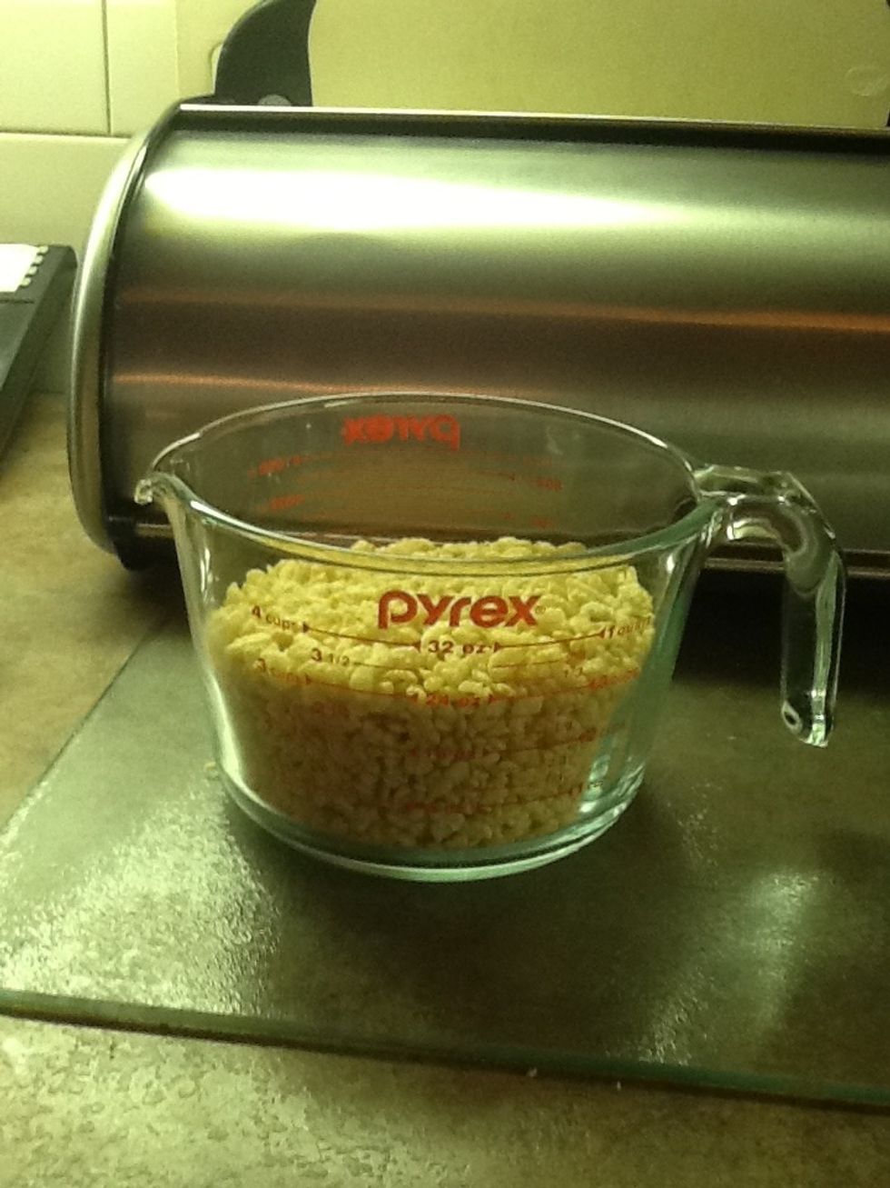 Add 3 cups of Rice Krispies into measuring cup