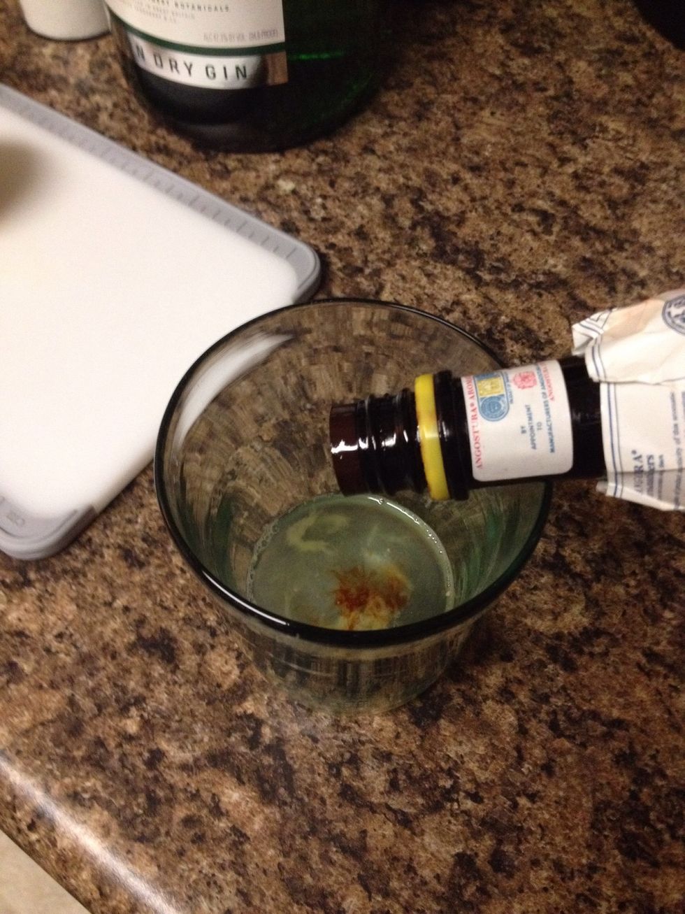 Add 3 dashes of Angostura bitters.