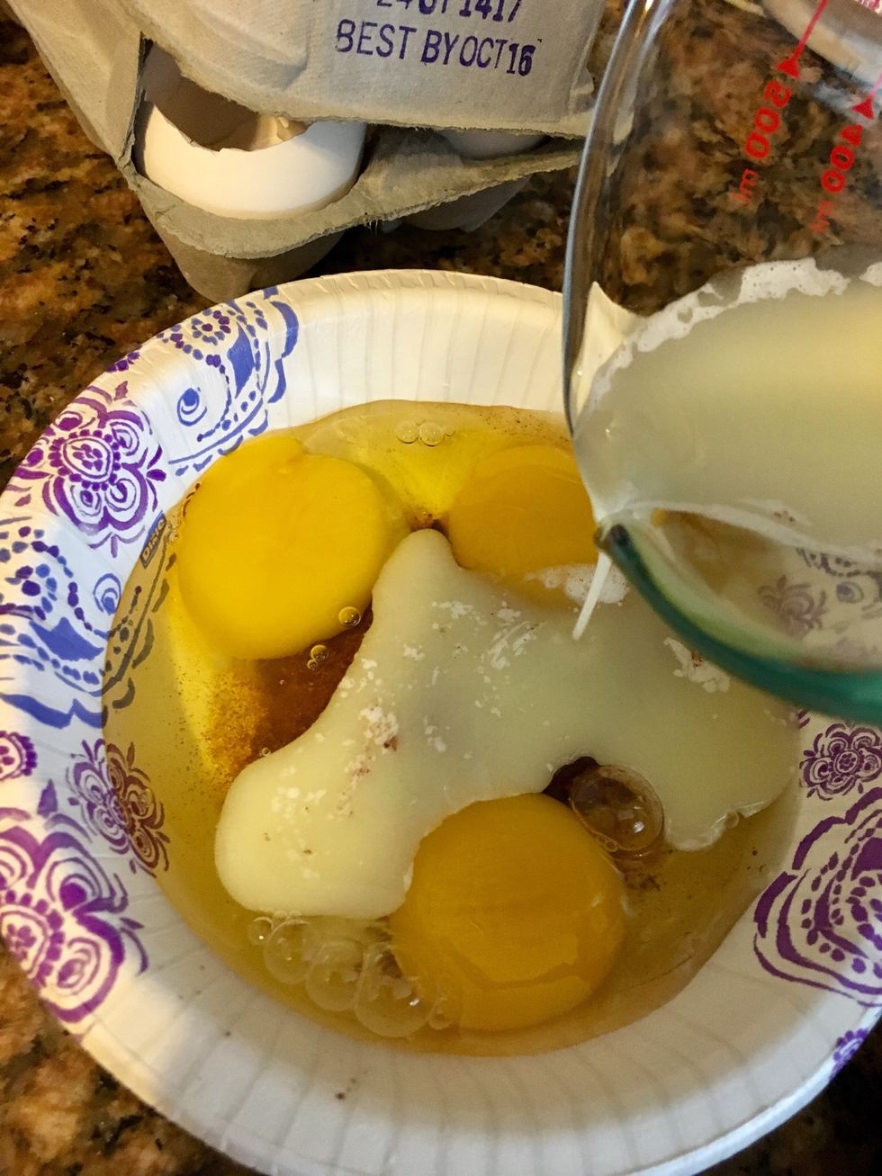 Add 3 eggs to the same bowl and then add the melted butter