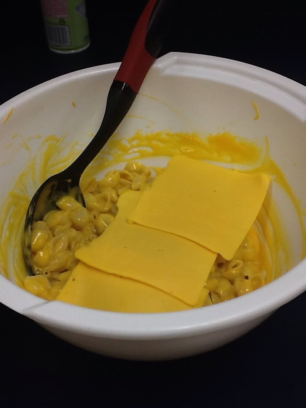 Add 3 slices of American cheese