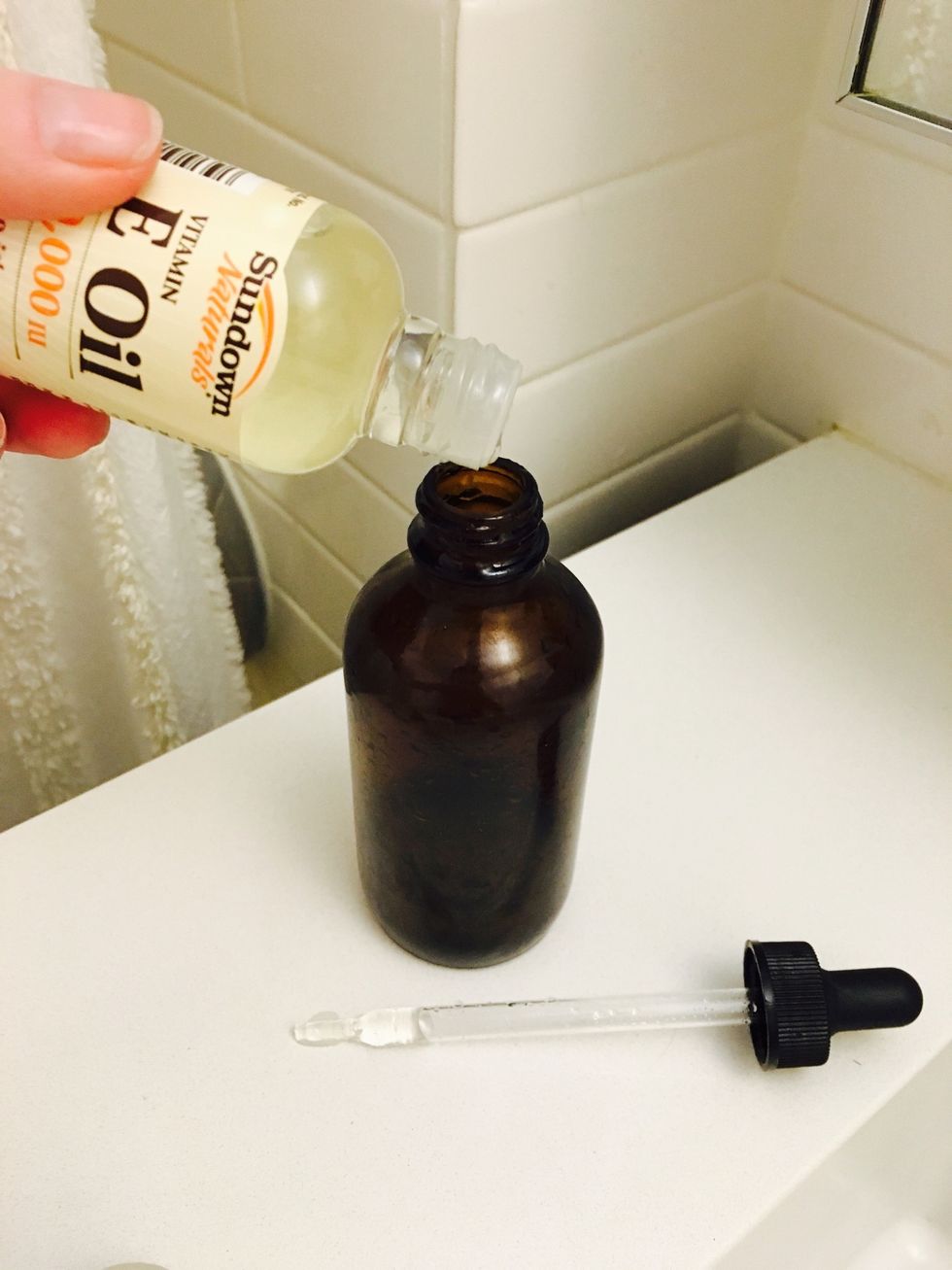 Add 3 small drops of Vitamin E oil. Shake. Note: you can test the ph of this serum using a ph strip. It's best to have the ph remain between 2.8 and 3.4.