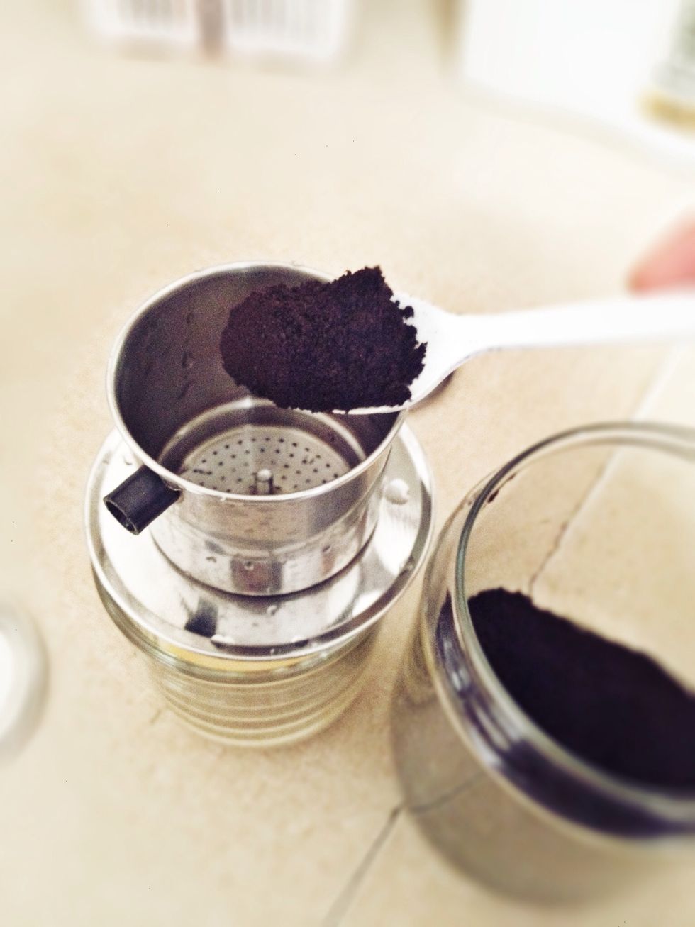 Add 3 tablespoons of coffee into filter