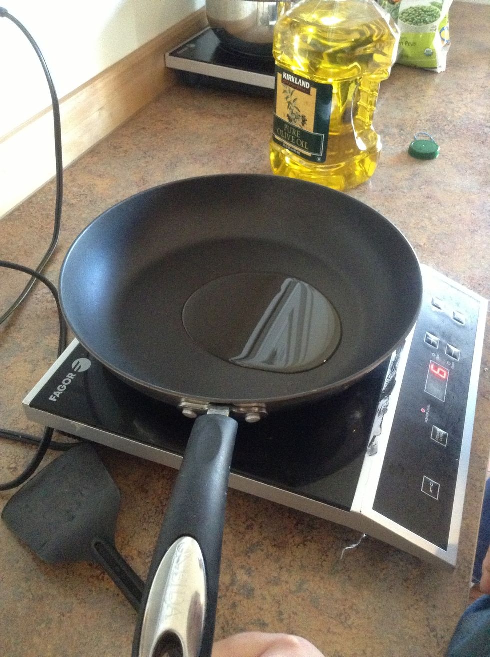 Add 3 tablespoons of olive oil to skillet