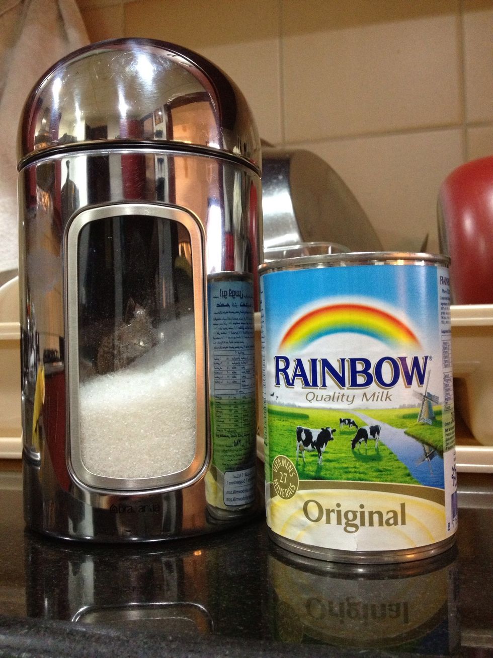 Add 3 tbsp of evaporated milk and 2 tsp of sugar to each mug. Adjust milk and sweetness to your taste.