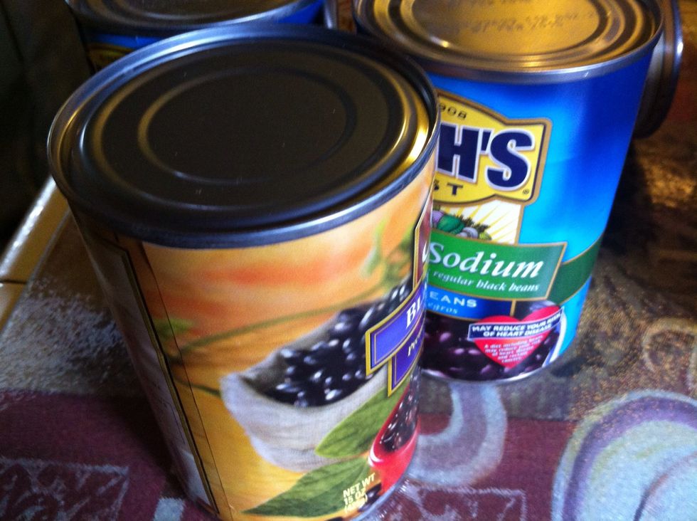 Add 4-6 cans of black beans or 6 cups of home cooked black beans, including liquid.