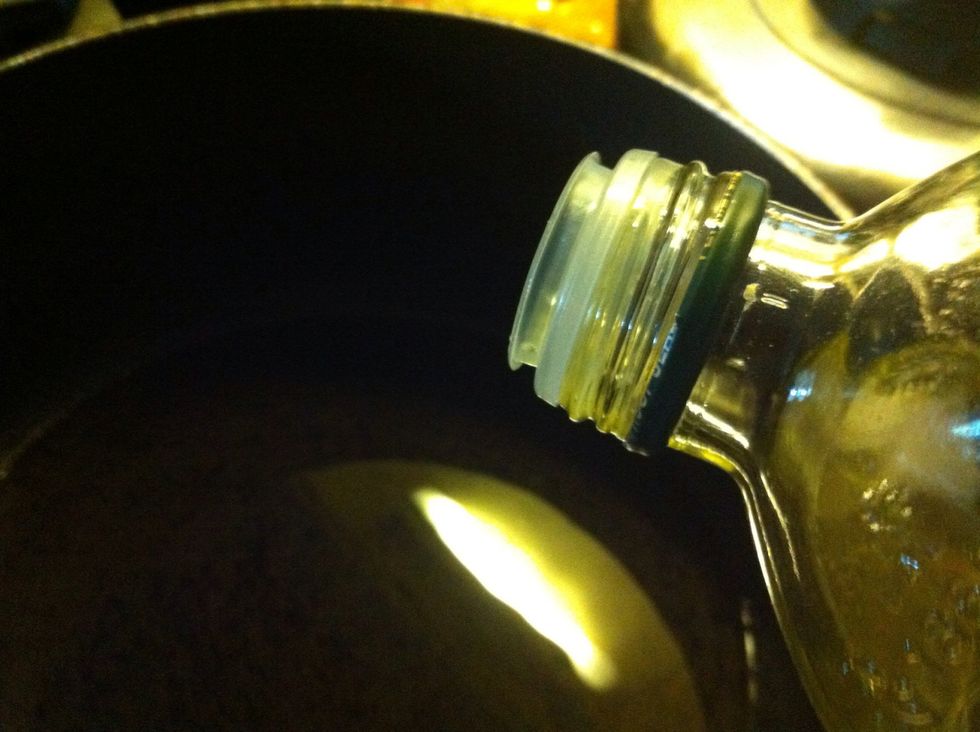 Add 4-6 tablespoons of olive oil to large soup pan and bring up to medium high heat.