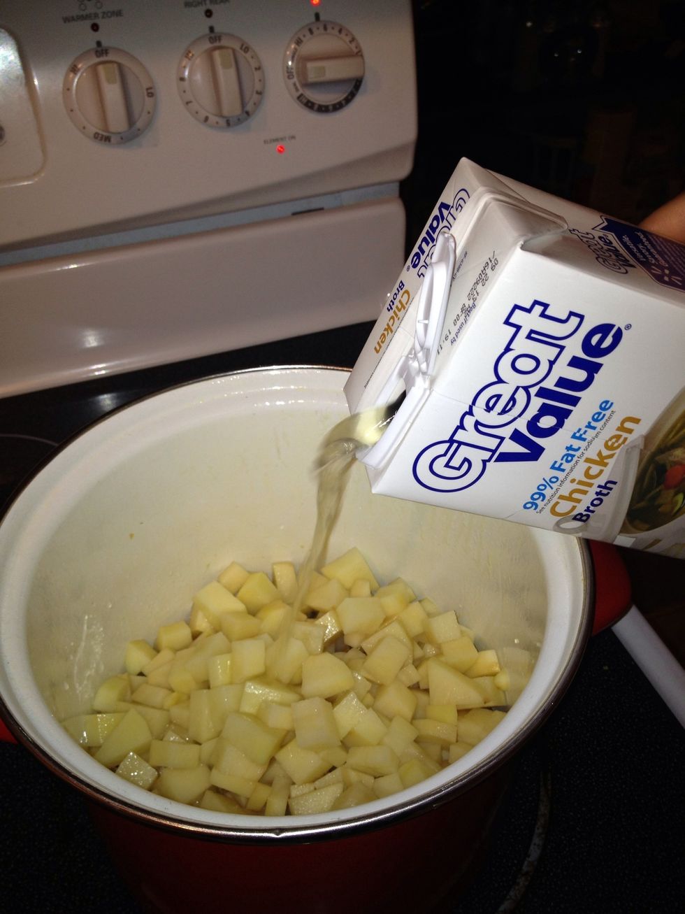 Add 4 cups of chicken broth.