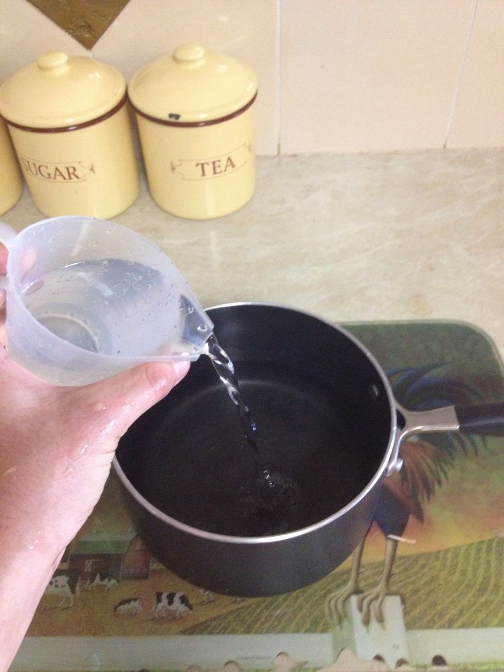 Add 4 cups of water (1 litre) to a saucepan.