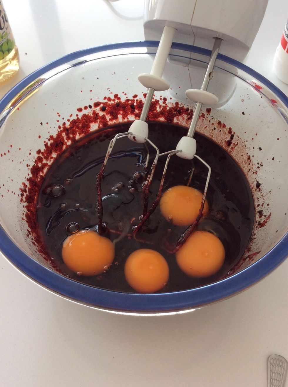 Add 4 eggs and beat until you get a smooth texture
