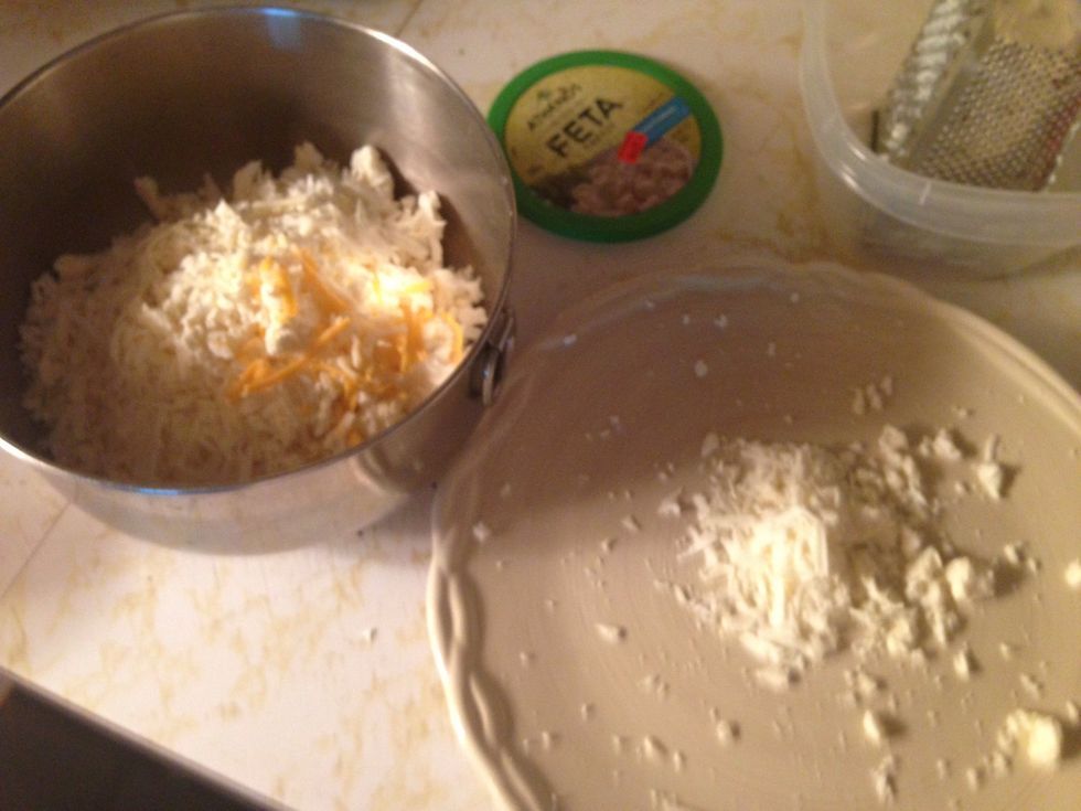 Add 4 Italian cheese (any mix will do) you want a cheese that melts and binds together to keep all the cheeses together and one that smells amazing!