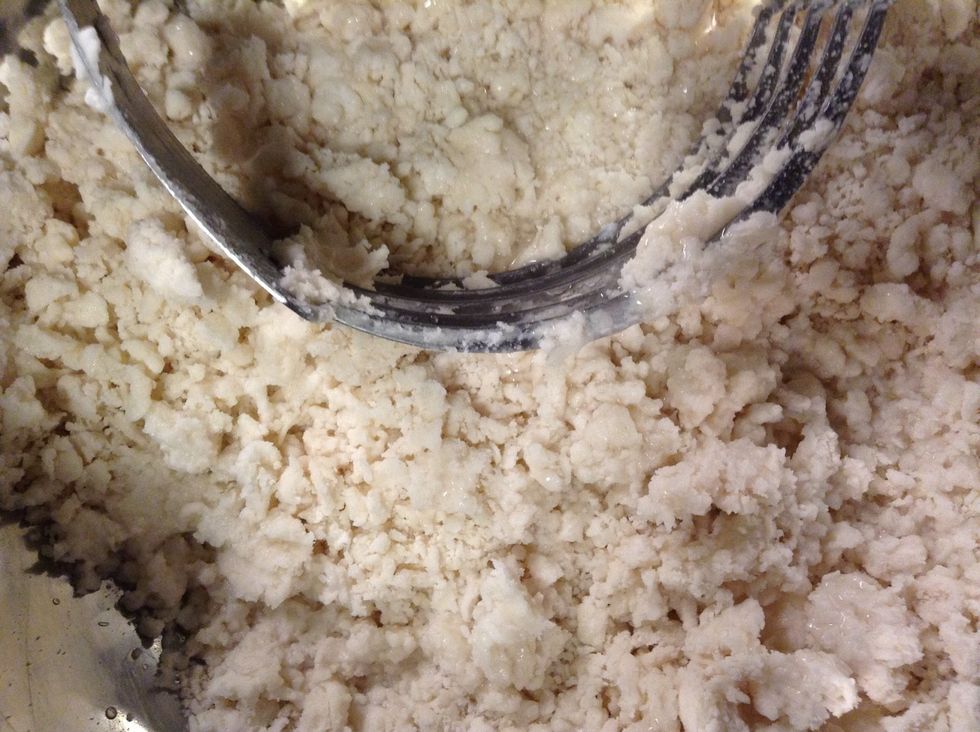 Add 4 or 5 tablespoons of ice water until it sticks together. I used 4 tablespoons.