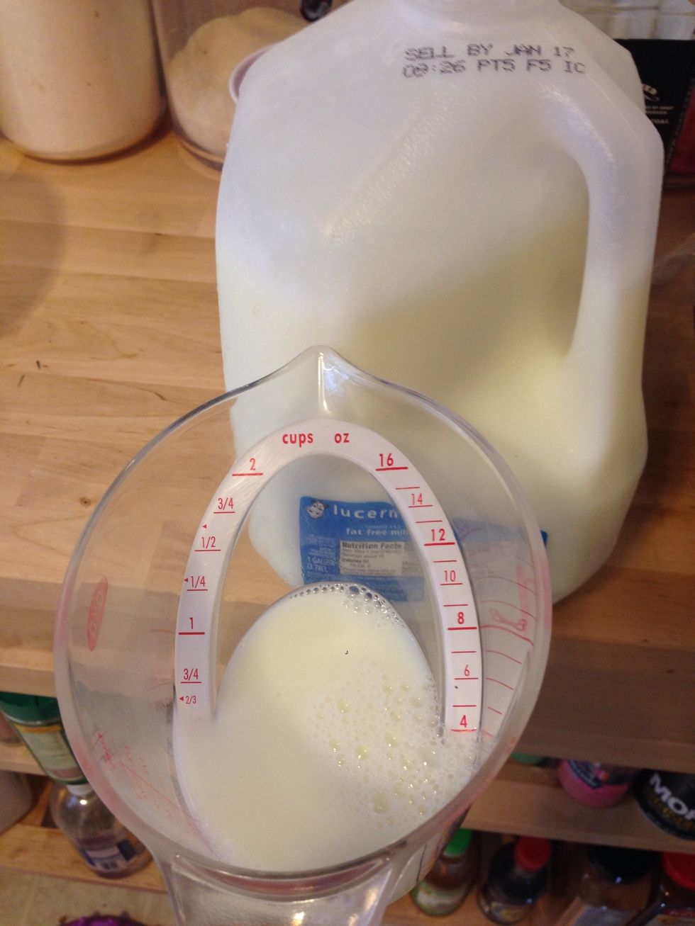 Add 4 oz of milk to the egg and whisk together. You can use buttermilk if you like that type of fried chicken. I didn't have any on hand. :/