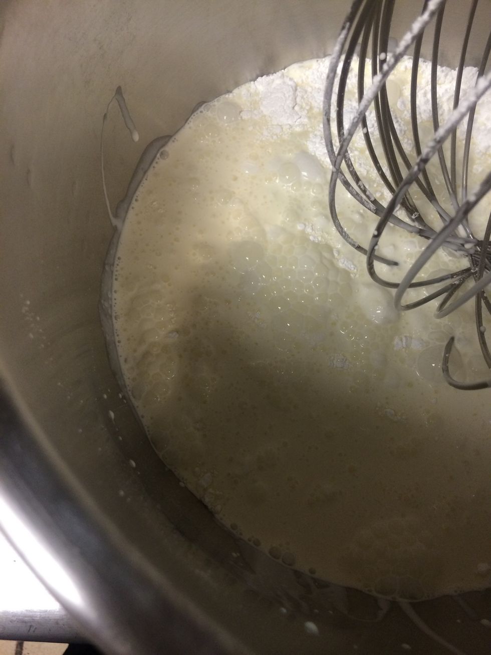 Add 4 quarts of heavy whipping cream,