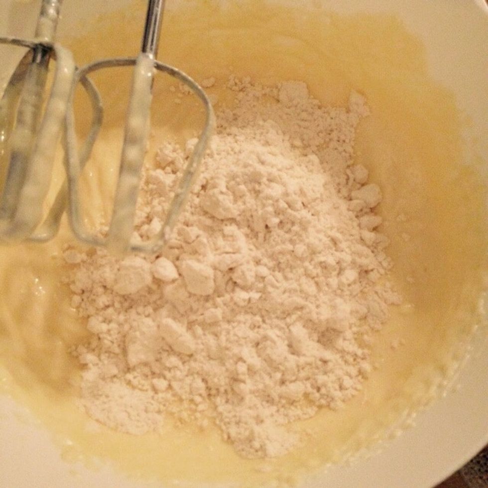 Add 4 tablespoons of flour and whisk again