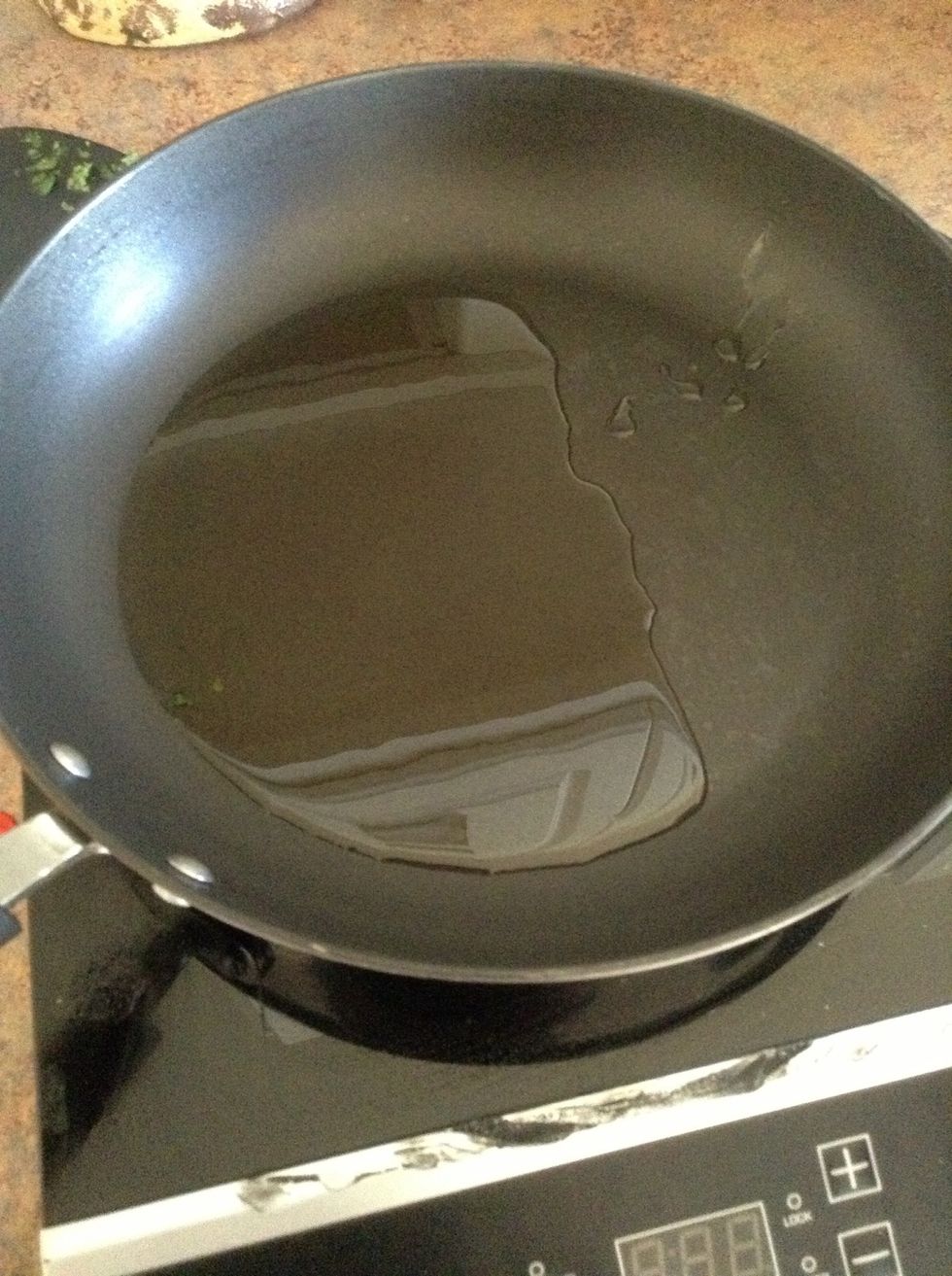 Add 4 tablespoons olive oil to skillet