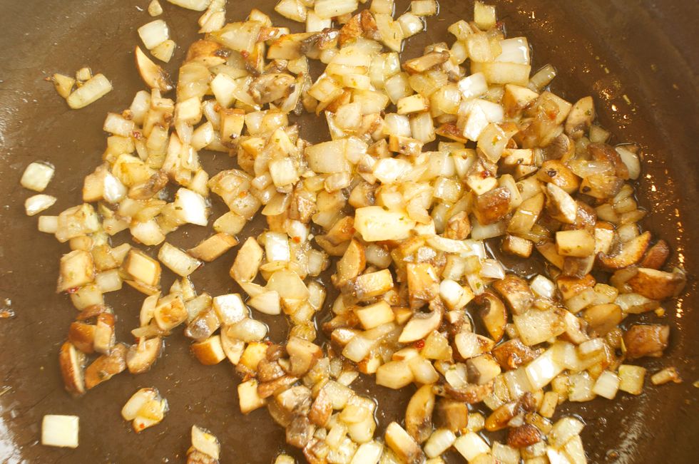 Add 4 tablespoons olive oil to your pan over medium-high heat. Once it's nice and heated, add the onions and the mushrooms, as well s 1 teaspoon of Mexican in a Minute. Saute for about 7-8 minutes.