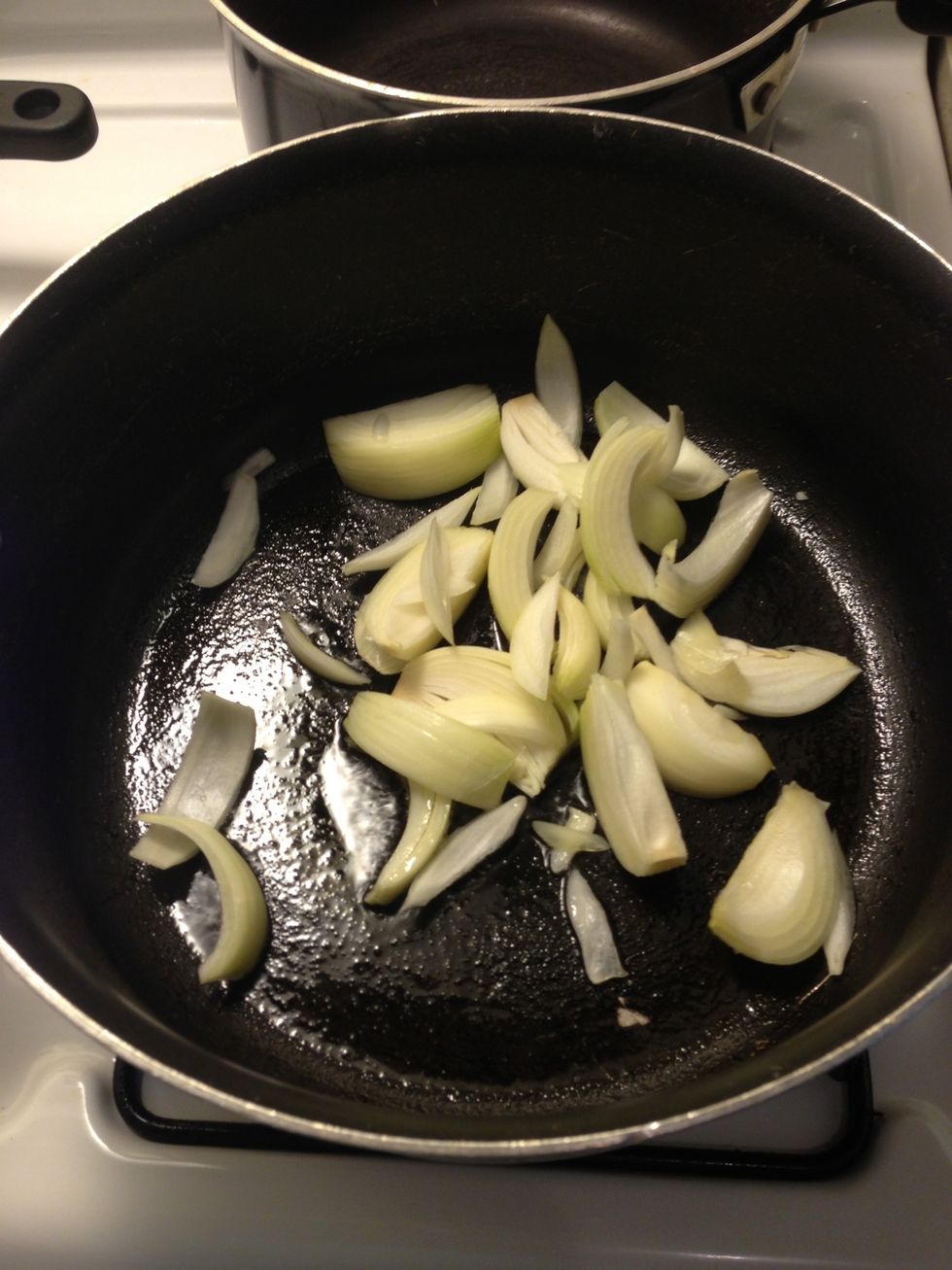 Add 5.25 oz of onion and stir so that the oul is coated over the onion and wait for 30 second