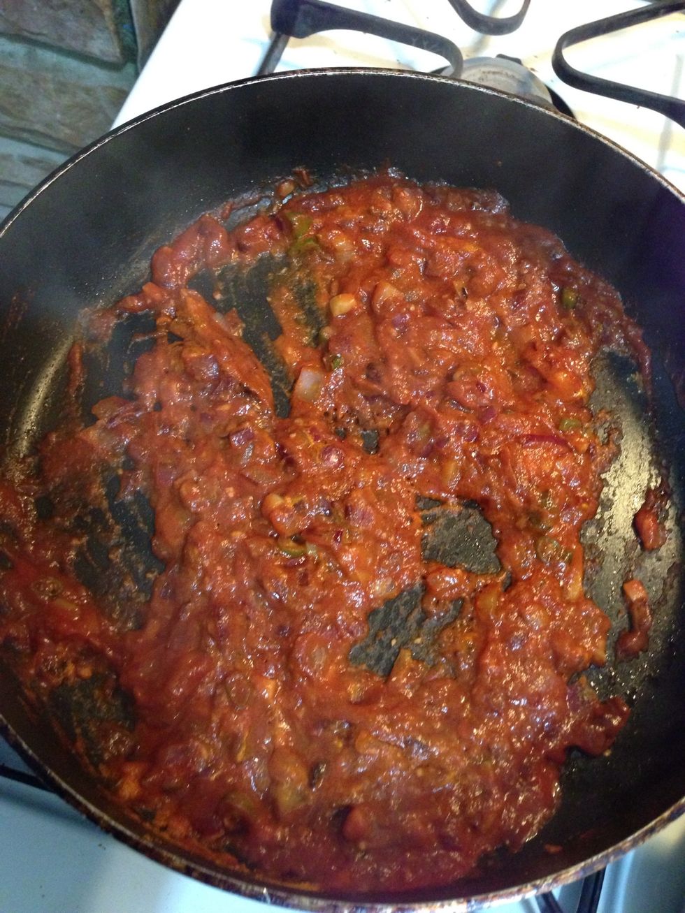 Add 5 tablespoon tomato puree