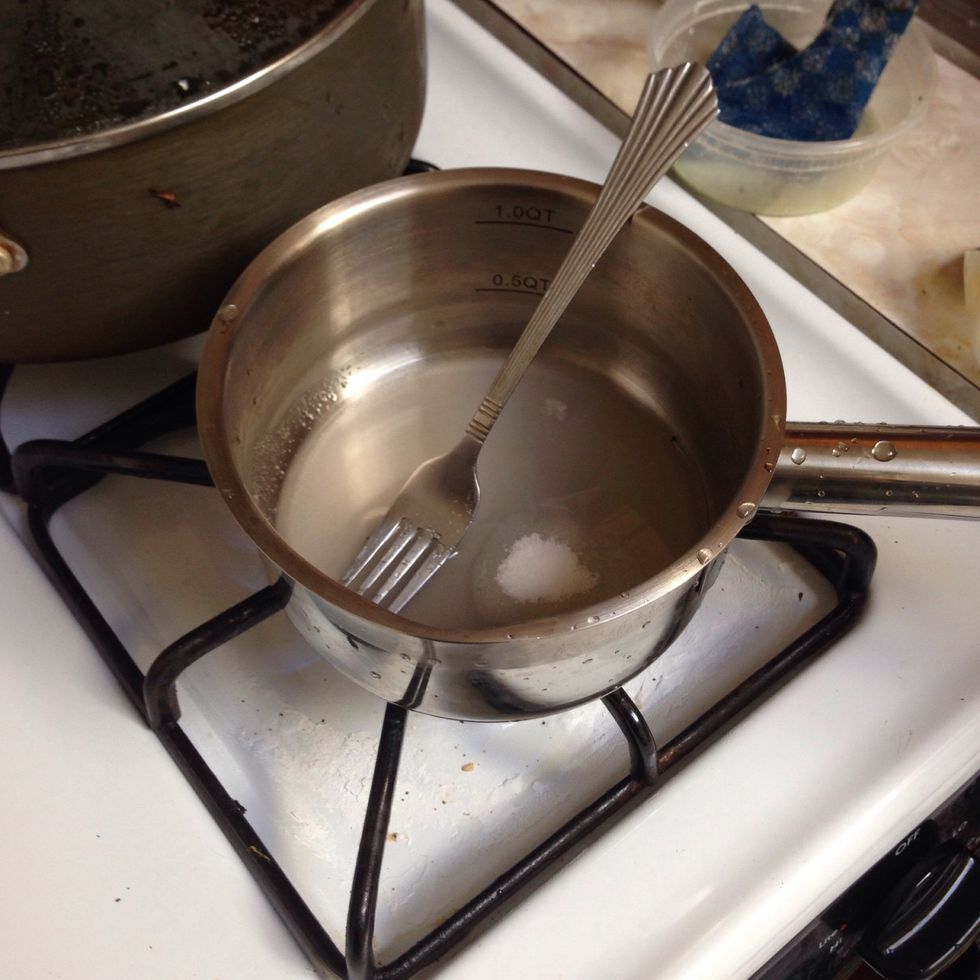 Add 5 tablespoons of sugar in a pot with 1/4 cup water on stove top. Heat sugar until the edges of the inner-pot become a dark brown and the caramels zed sugar itself is a light brown.