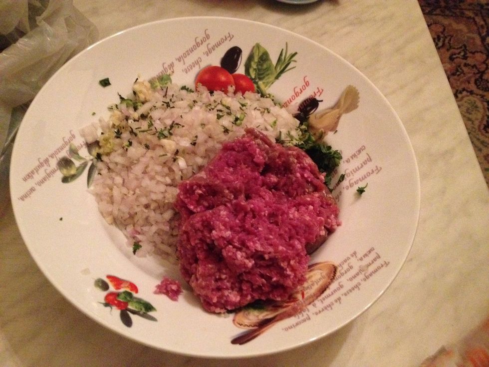 Add 500gr or 1 pound (roughly 2 cups) of minced beef. I have used mix of beef and lamp. I also tried the vegetarian version with soya meat and it worked.