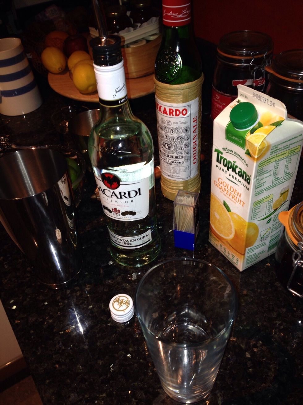 Add 50ml of white rum to your mixing glass.