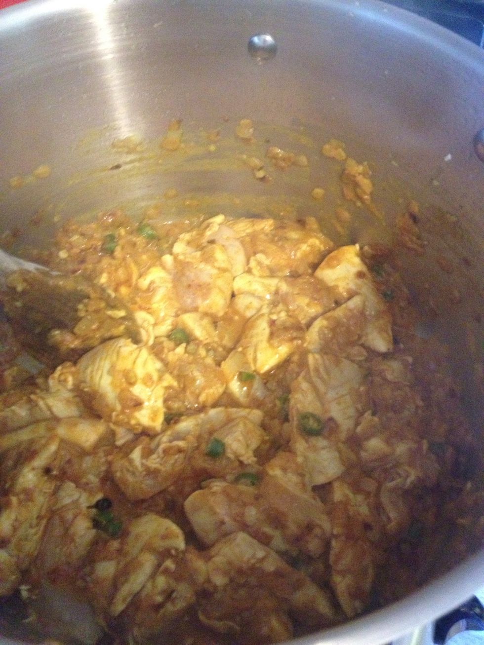 Add 50ml water and the chicken and cook in for 2-3 mins