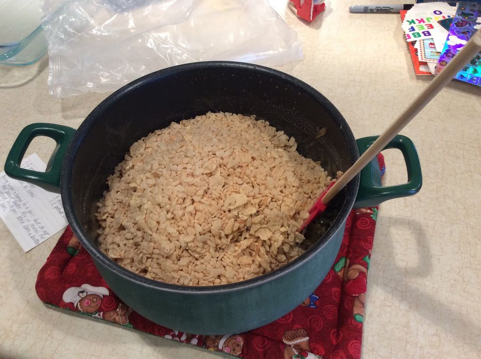 Add 6 cup special k cereal and stir fast so corn syrup does not dry