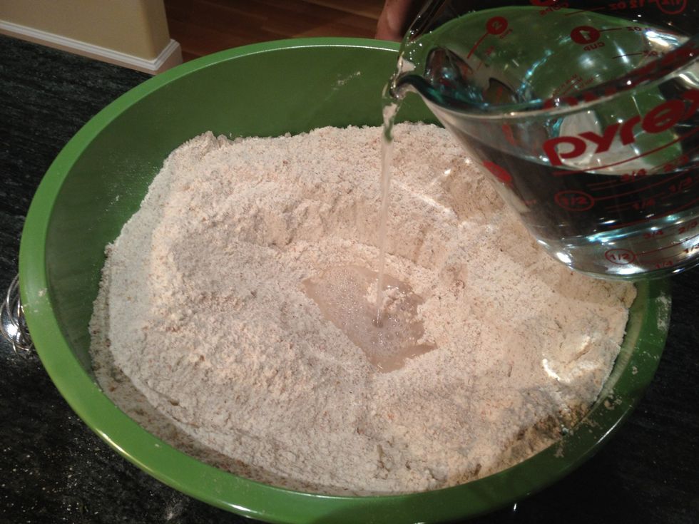 Add 6 cups of cold water to the flour mixture.