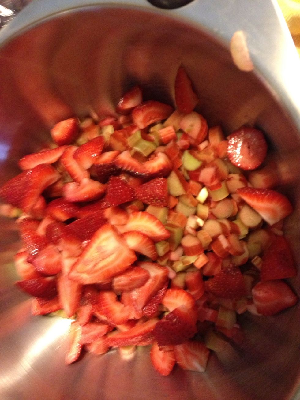 Add 6 cups of rhubarb and 2 cups strawberries to a bowl