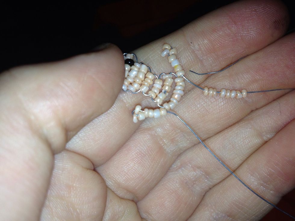 Add 8 beads to one side and continue as usual using the opposite wire to thread through..