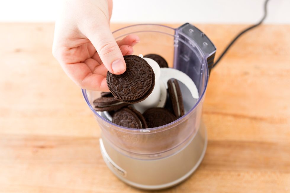 Add 8 Oreos to a food processor and pulse until crumbled.