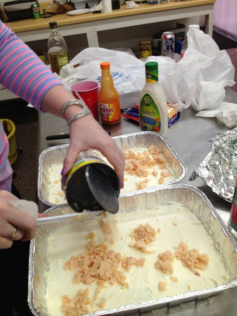 Add 8 ounces of chicken to each container.