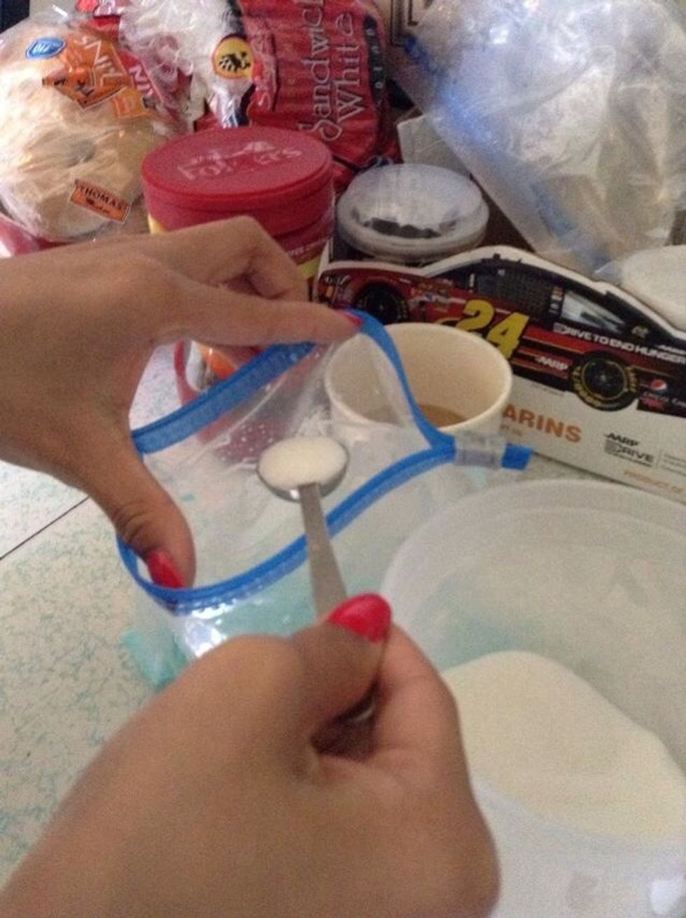 Add 8 teaspoons of sugar in the milk bag .