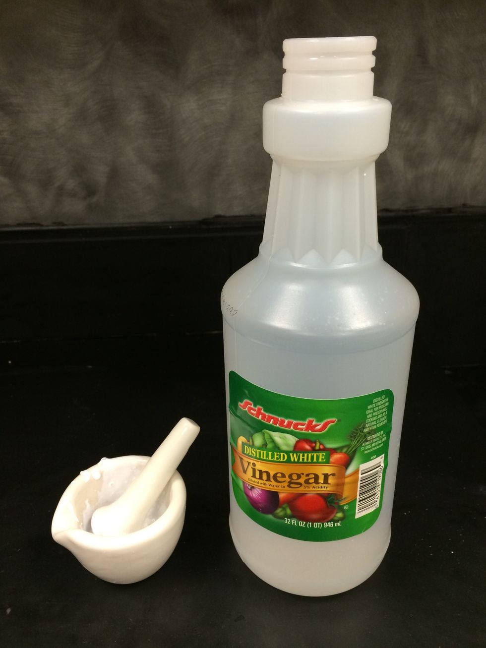 Add 9 mL vinegar in 1 mL increments. Grind it in a mortar and pestle.