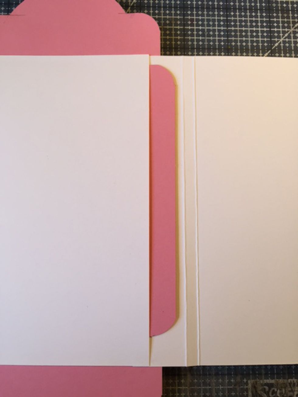 Add a 4" x 5 1/2" card stock tag to pocket.