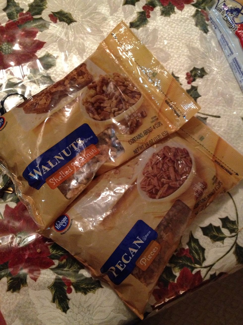 Add a bag of almonds and a bag of pecans into the bowl.