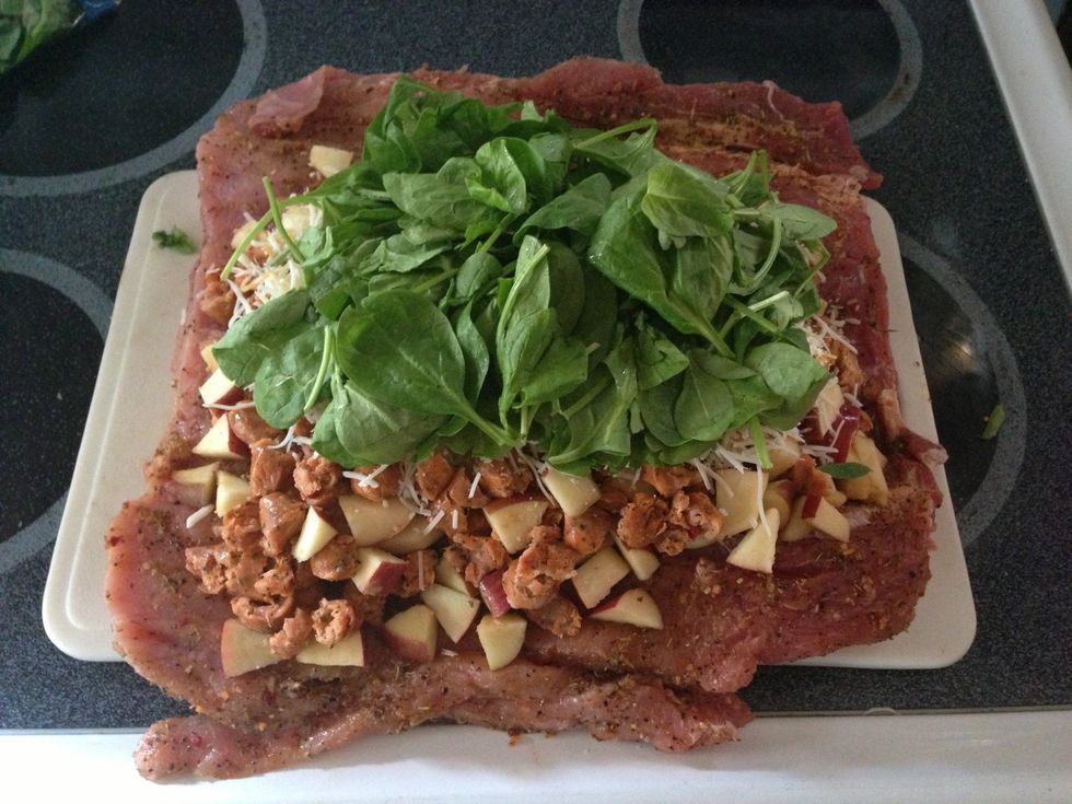 Add a big handful of fresh spinach on top, keep it mostly in the middle.