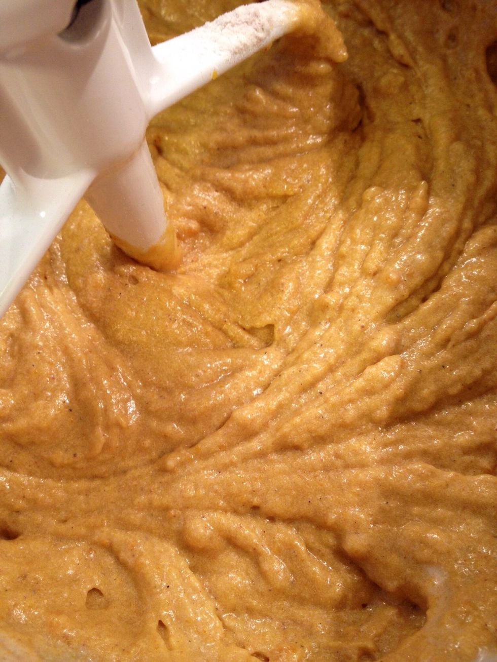 Add a bit of the dry ingredients, and alternate with adding milk, blending until batter is smooth after each addition.