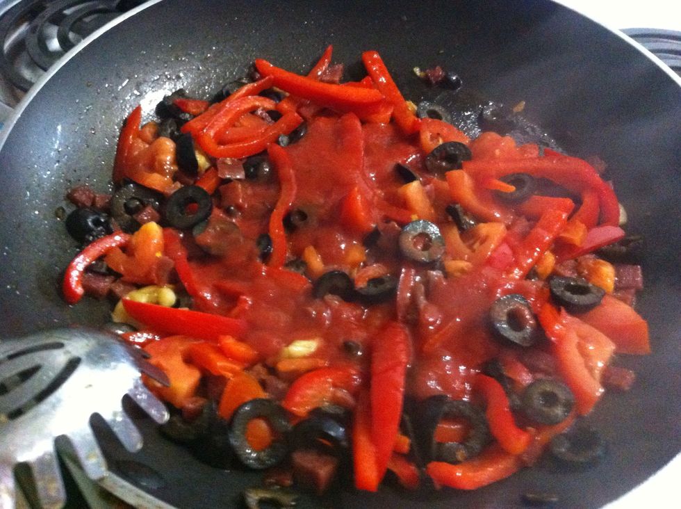 Add a bit of tomato paste just to make te sauce more "saucy"
