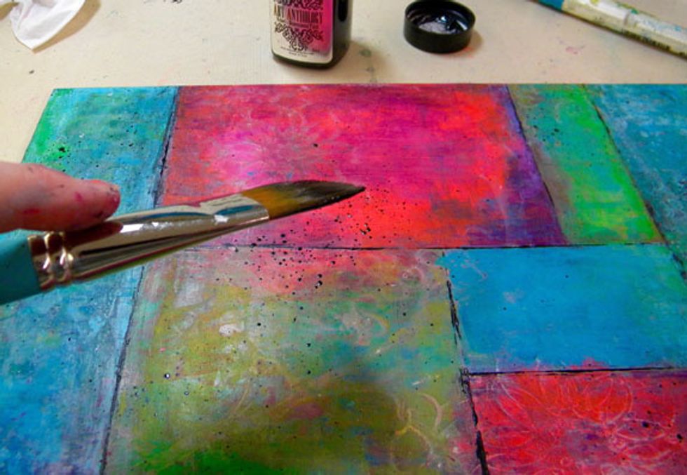 Add a bit of water to the Tuxedo and splatter it around randomly.