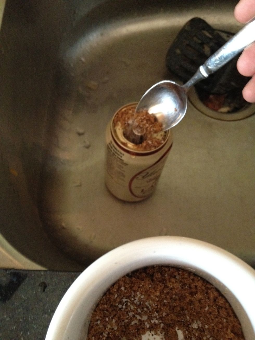 add a bit of your spice rub to the can. Do this over the sink because it might foam up on you.