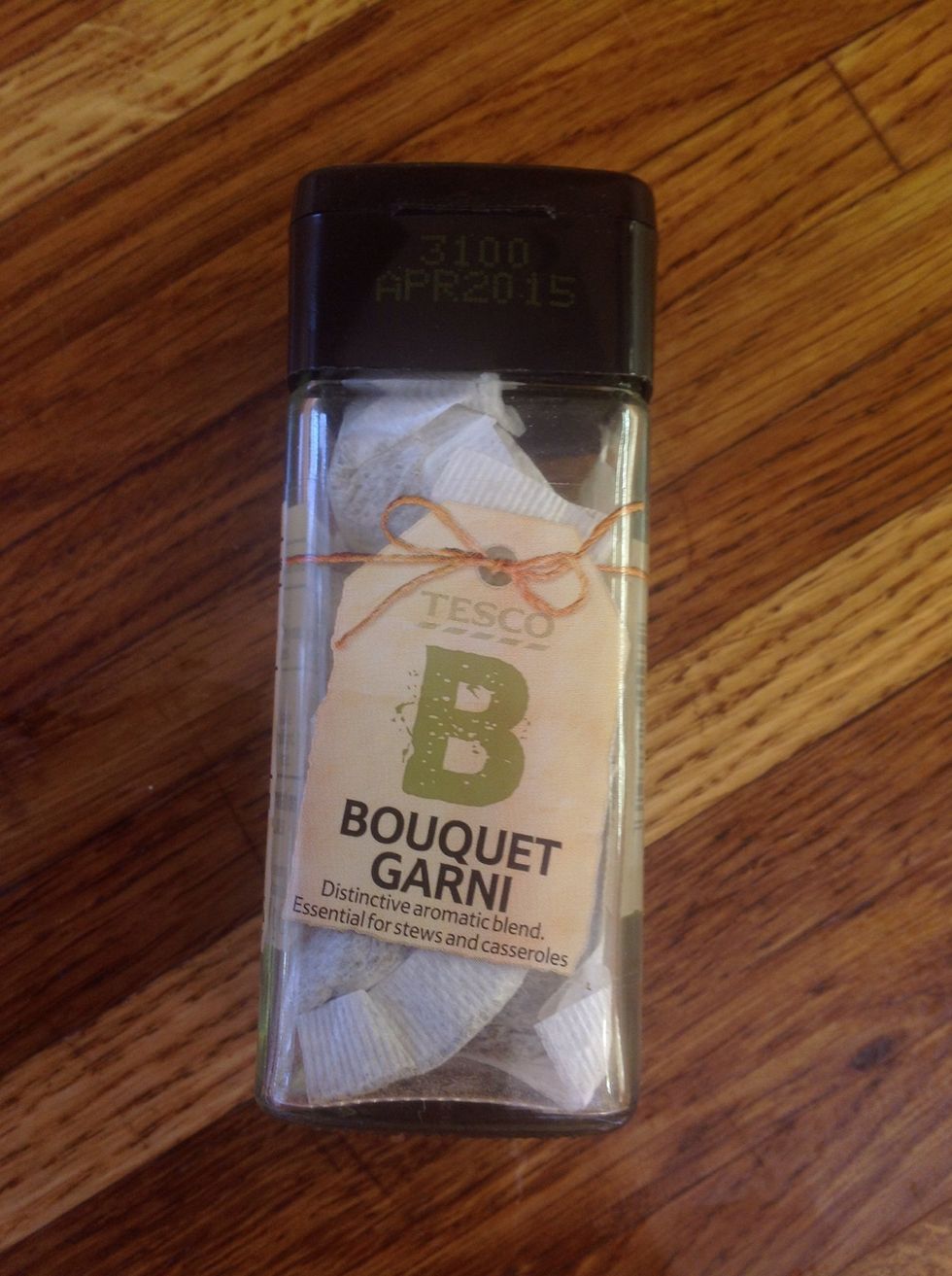 Add a bouquet garni (made with 2 dried bay leaves, a few sprigs of fresh flat leaf parsley and thyme tied together in a cheesecloth purse with a peice of kitchen twine)