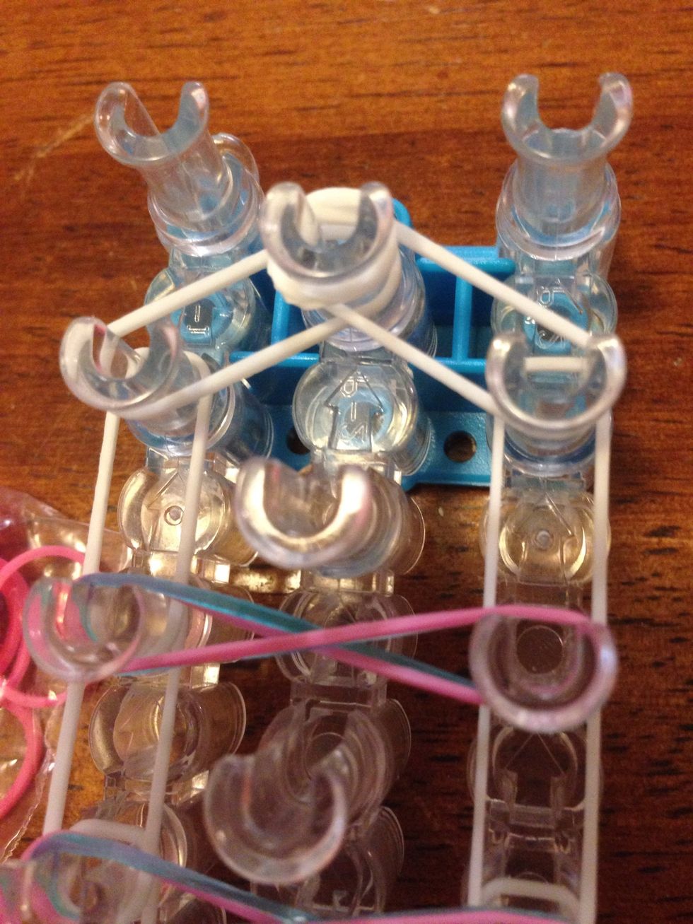 Add a cap band on the top middle pin.