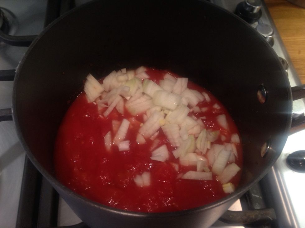 Add a chopped onion to a tin of tomatoes