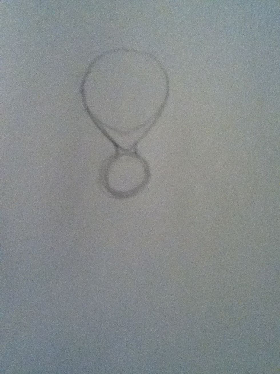Add a circle about the same size as the head to the neck, don't worry if it's messy.