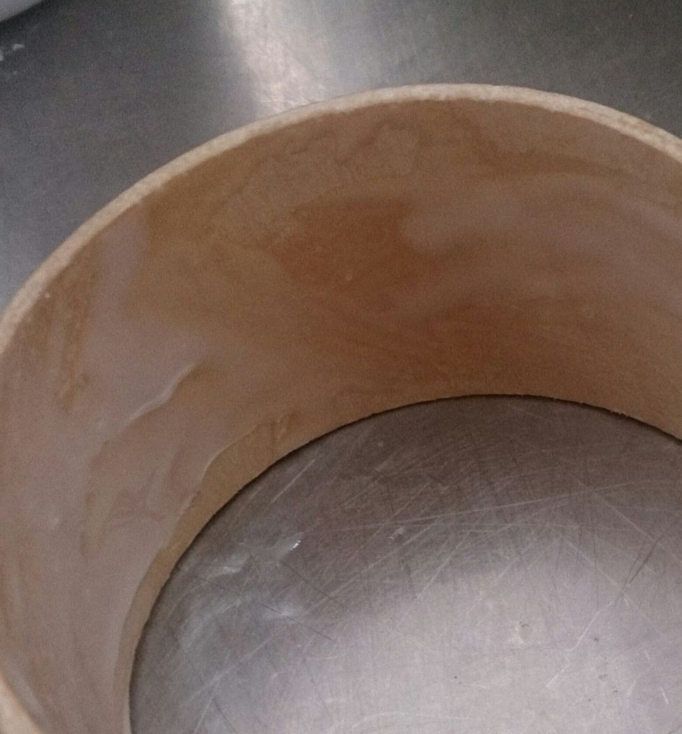 Add a coating of glue to the inside of the bangle. Try to spread it evenly. It would be best to only do one section at a time, and add more glue as you go along.