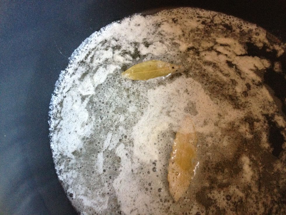 Add a couple bay leaves once the butter has melted.